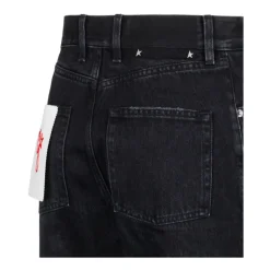 Schwarze Wide Leg Jeans mit Goldstern