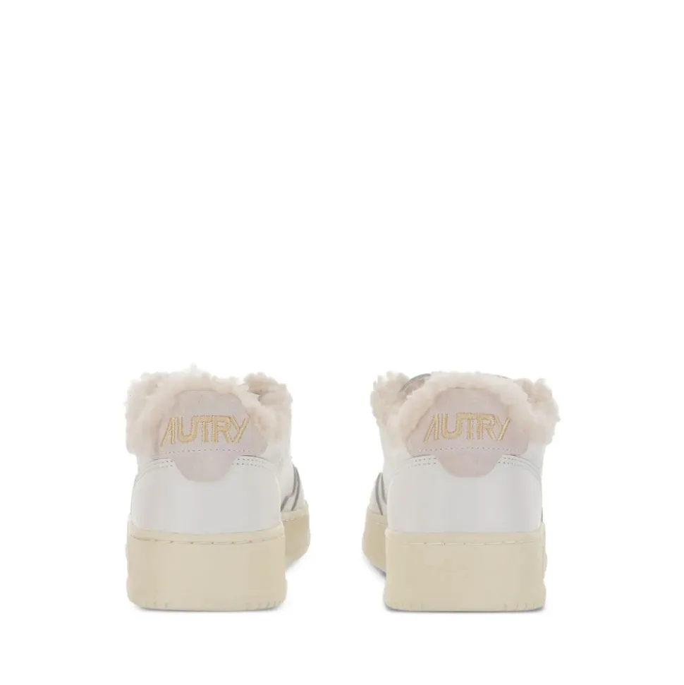 Weiße Leder Sneakers mit Shearling-Besatz